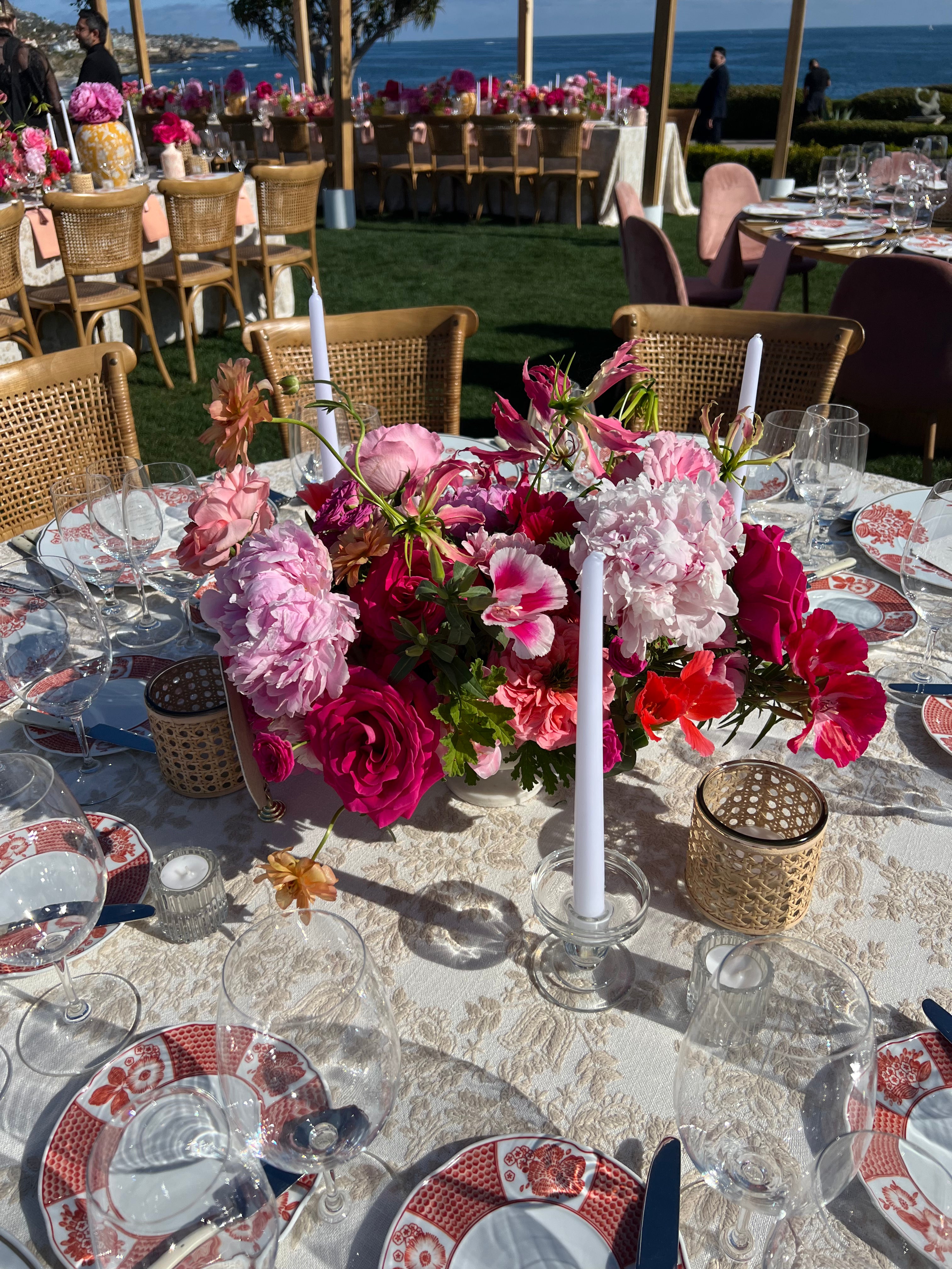 Colorful reception flowers for a beachfront celebration