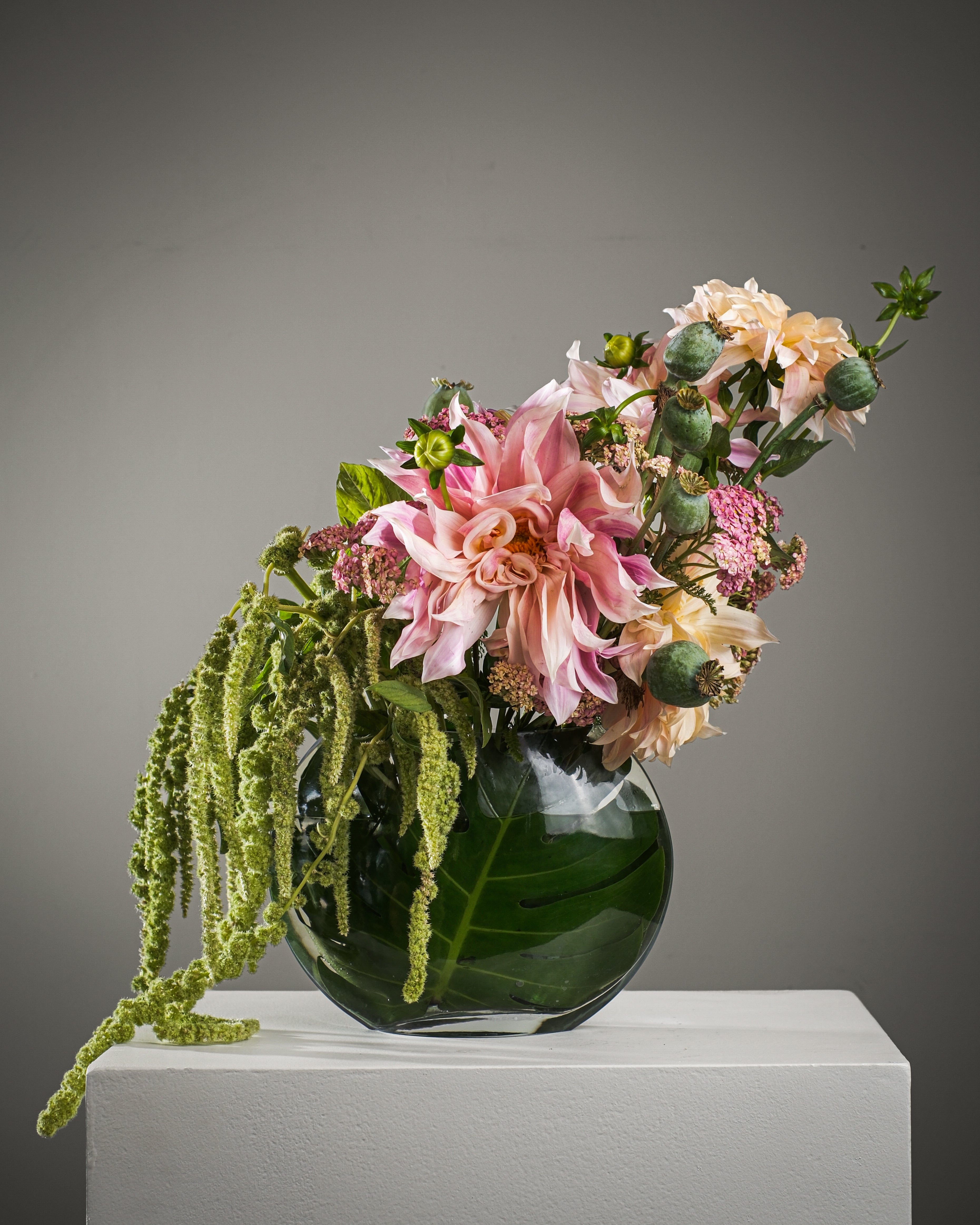 French-style vase arrangement with pastel roses, green amaranthus and peach accent flowers for flower delivery in Los Angeles and Beverly Hills