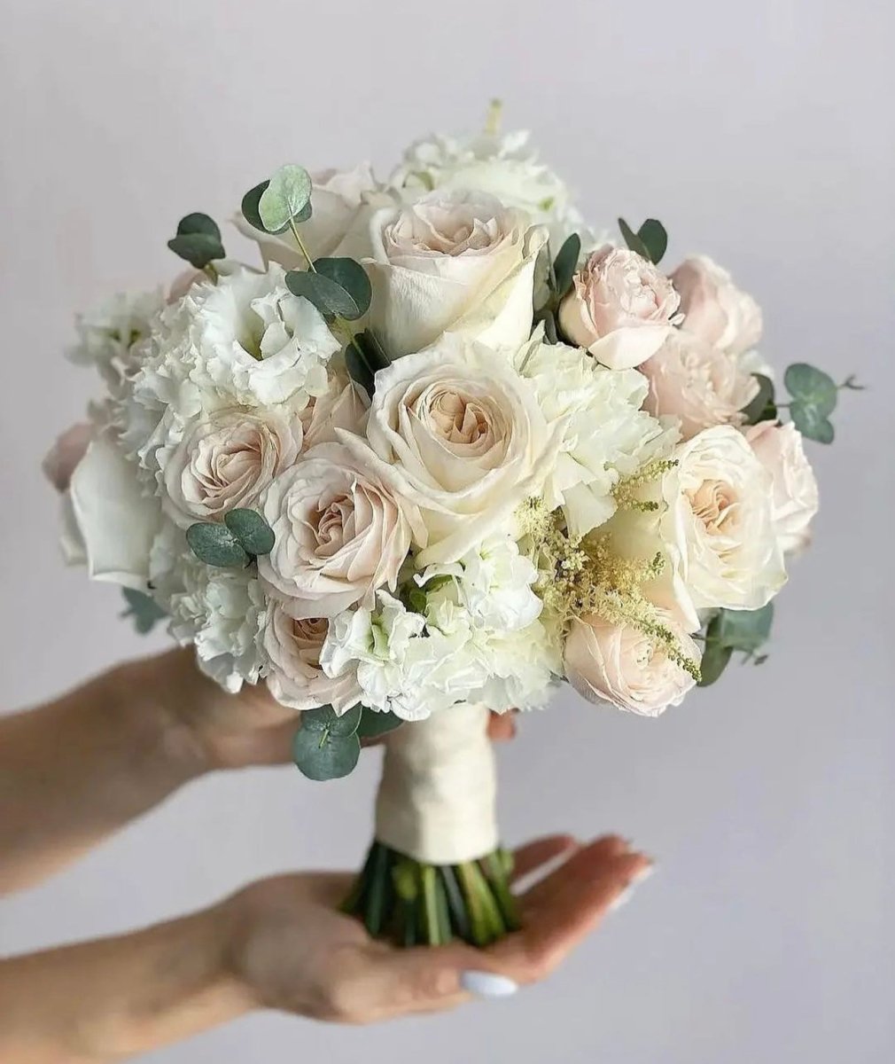 white rose wedding bouquet with greenery