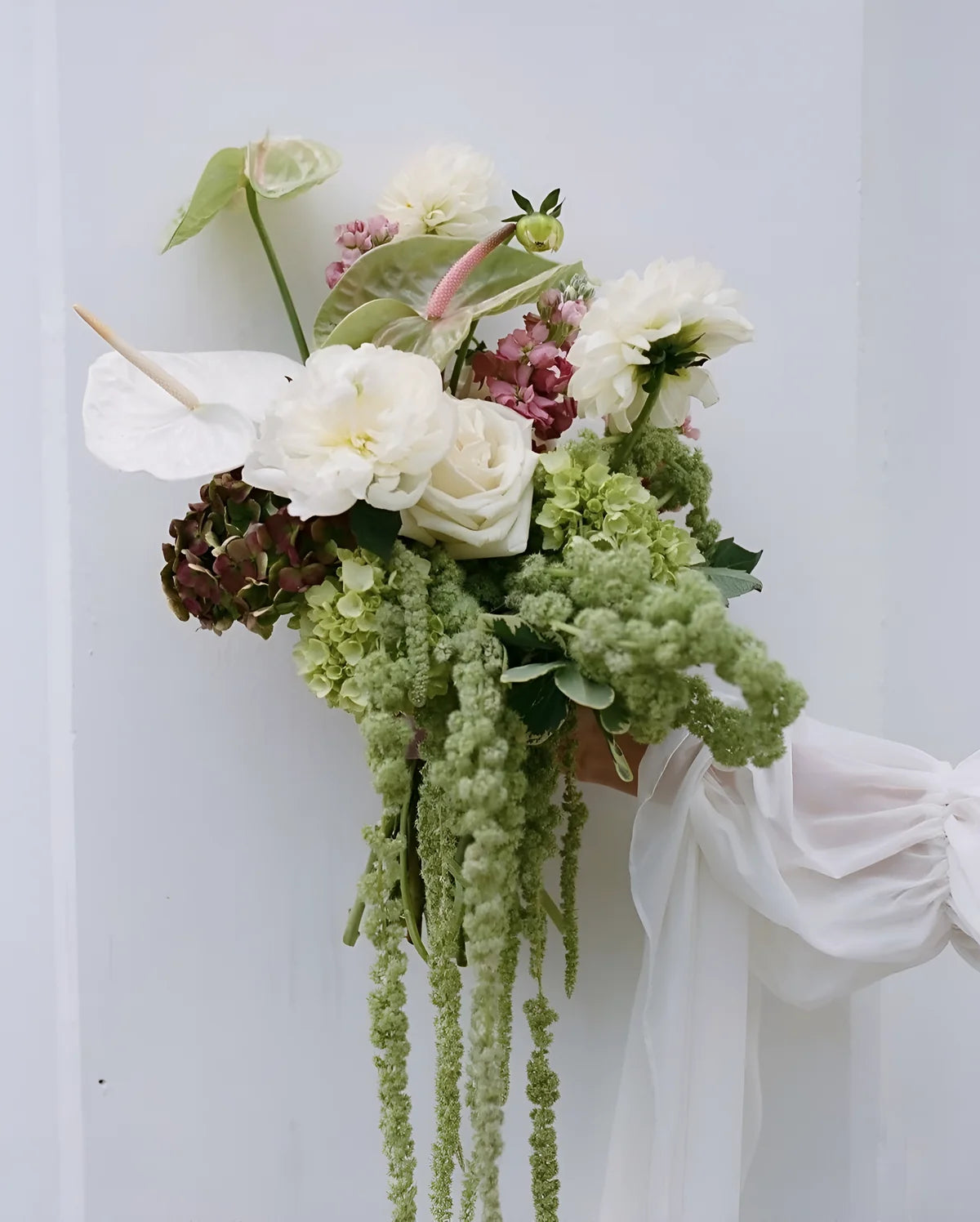 Elegant bridal bouquet with soft seasonal flowers for a luxury wedding