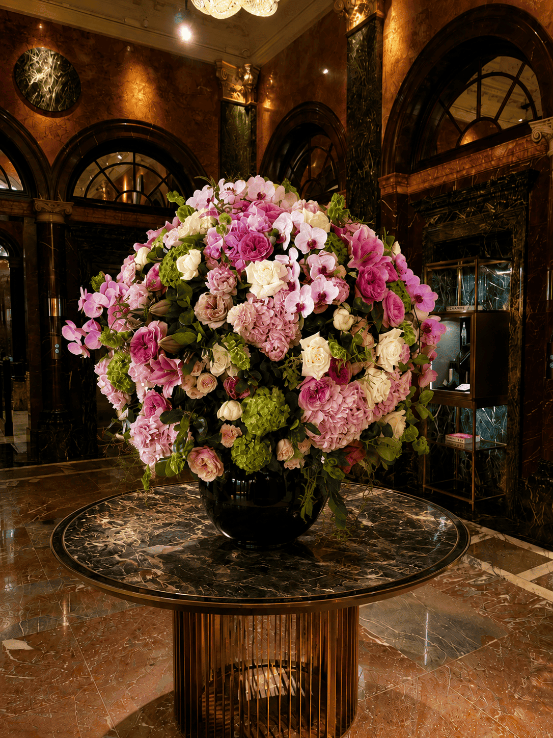Entrance and welcome table florals for a private club event in Los Angeles