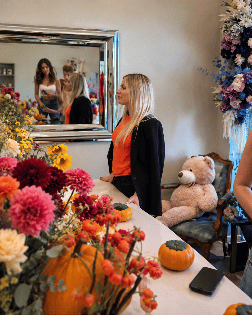 Fall pumpkin floral arrangement created during a Halloween workshop in Los Angeles
