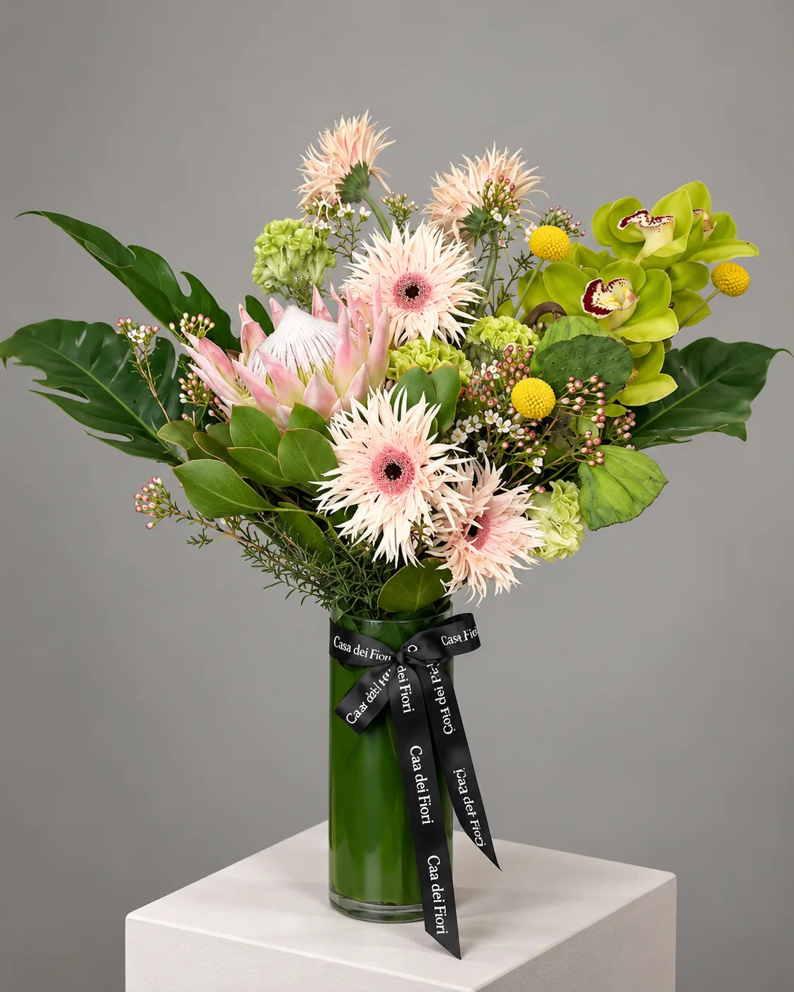 Pink Protea and Green Orchid Flower Arrangement in Los Angeles