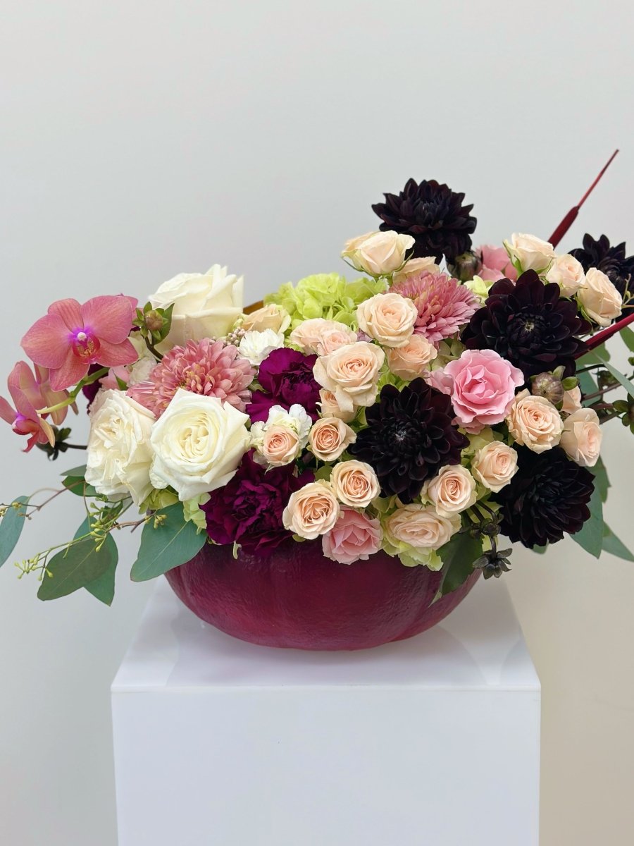 pumpkin vase with flowers