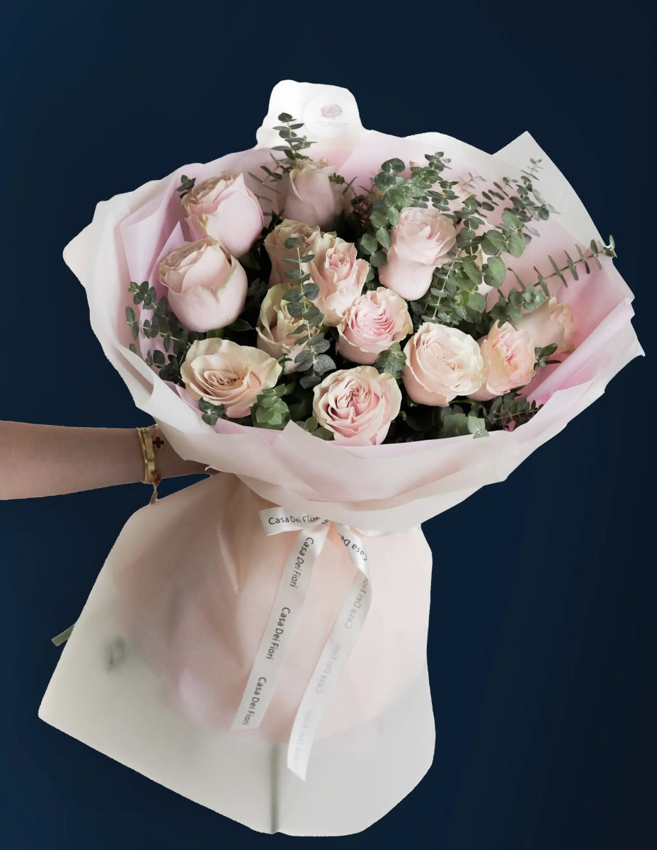 white roses and eucalyptus